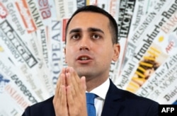 Italy Deputy Prime Minister and Labour, Industry Minister Luigi Di Maio gestures during a press conference, Nov. 9, 2018, in Rome.