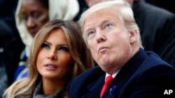 FILE - President Donald Trump and first lady Melania Trump attend ceremonies at the Arc de Triomphe, Nov. 11, 2018 in Paris. 