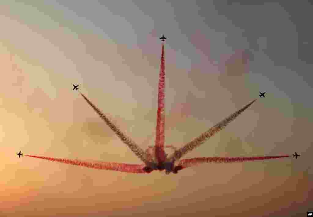 The Saudi Hawks Display Team performs at the Bahrain International Airshow in Sakhir, Bahrain. 