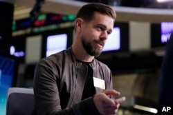 FILE - Twitter's Jack Dorsey is interviewed on the floor of the New York Stock Exchange, Nov. 19, 2015. The chief executive apologized Thursday, Nov. 17, 2016, after the service let through an ad promoting a white supremacist group.