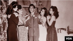 Larry Ching, “the Chinese Frank Sinatra,” with fellow performers at the Forbidden City nightclub in the early 1940s (Courtesy DeepFocus Productions, Inc.).