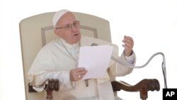 Pope Francis delivers his speech during his weekly general audience in St. Peter's Square at the Vatican, Sept. 12, 2018.