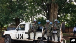 United Nations Peacekeepers drive through Yei, South Sudan, July 13, 2017. The United Nations peacekeeping mission's chief says Yei has "gone through a nightmare." Since fighting spread to the city a year ago, 70 percent of the population has fled.