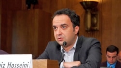 Parazit host Kambiz Hosseini testifying before U.S. Senate panel on Iran relations.