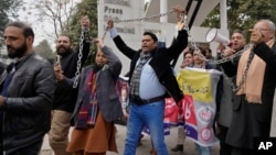 FILE - Journalists take part in a protest in Islamabad, Pakistan, Jan. 28, 2025, to condemn legislation passed by parliament that targeted electronic crimes, which critics said was designed to suppress freedom of speech.