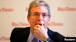 FILE - Former Rio Tinto Chief Executive Tom Albanese during a news conference in Sydney, Nov. 29, 2012. Australia's corporate watchdog accuses Albanese, another former executive and Rio Tinto of "misleading and deceptive conduct."