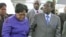 Zimbabwean President Robert Mugabe (R) with Vice President Joice Mujuru (L). (File Photo)