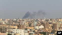 This grab from video shows smoke rising over Khartoum, Sudan, Sept. 26, 2024, after Sudan’s military started an operation to take areas of the capital from its rival, the paramilitary Rapid Support Forces. 