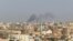 This grab from video shows smoke rising over Khartoum, Sudan, Sept. 26, 2024, after Sudan’s military started an operation to take areas of the capital from its rival, the paramilitary Rapid Support Forces. 