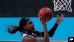 Kentucky guard Robyn Benton shoots during the second half of a college basketball game against Idaho State in the first round of the women's NCAA tournament at the Alamodome in San Antonio, March 21, 2021.