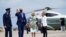 President Joe Biden waves as he and first lady Jill Biden walk to board Air Force One for a trip to Georgia to mark his 100th day in office, April 29, 2021, in Andrews Air Force Base, Md.