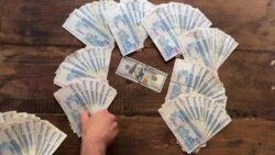 له سلهاو زرو تومان څخه د یوه ډالر د بیې لوړوالی او پر بازار او خلکو باندې یې اغیزې