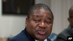 FILE — Mozambique's President Filipe Nyusi speaks during a meeting with U.S. authorities in Washington, on September 22, 2023.