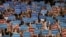 Delegates hold up signs during Maryland Gov. Martin O’Malley speech at the Democratic National Convention in Charlotte, N.C., on Tuesday, Sept. 4, 2012. (AP Photo/Charlie Neibergall)