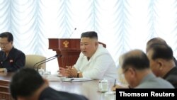 North Korean leader Kim Jong Un takes part in the Political Bureau meeting of the 7th Central Committee of the Workers' Party of Korea (WPK) in this image released June 7, 2020 by North Korea's Korean Central News Agency (KCNA).