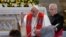 Pope Francis gives a blessing as he attends a meeting with bishops, priests, deacons, members of monastic orders, seminars and pastoral workers during his apostolic journey at St. Stephen's Basilica in Budapest, Hungary, April 28, 2023. 