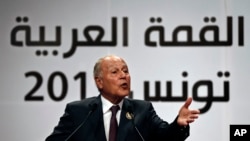 FILE - Arab League Secretary-General, Ahmed Aboul Gheit, speaks during a joint press conference with Tunisian Foreign Minister Khemaies Jhinaoui, at the end of the Arab Summit, in Tunis, Tunisia, March 31, 2019. 