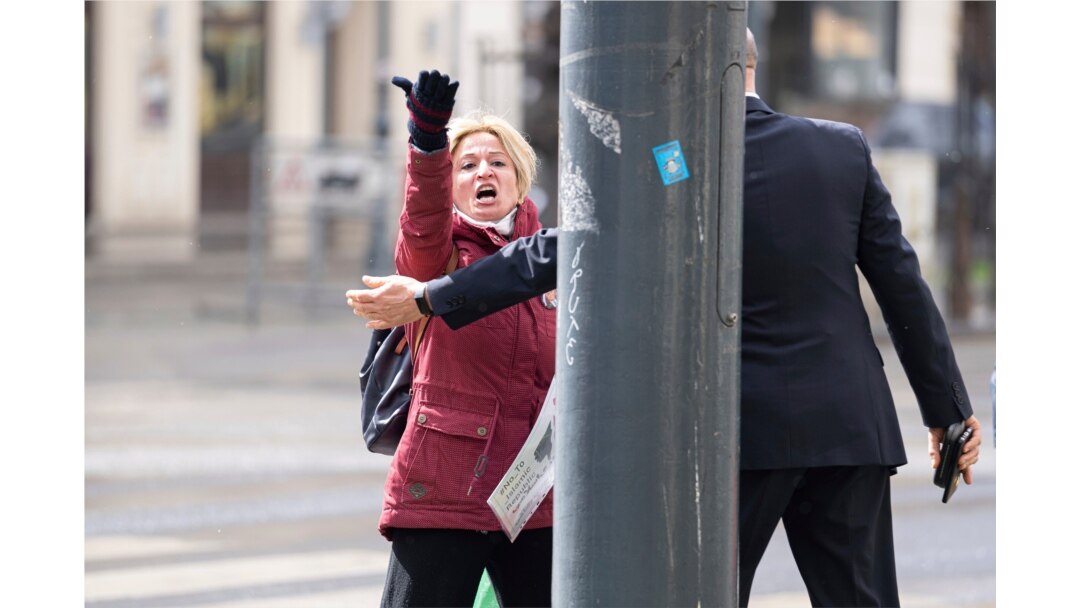 Protestors of an Iranian opposition group are sent away near the Grand Hotel Wien where closed-door nuclear talks with Iran take place in Vienna, Austria, April 6, 2021.