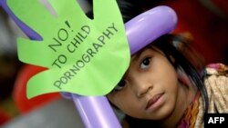 Une écolière lors d'un forum de l'Onu sur la pornographie juvénile, à Manille aux Philippines, le 5 juin 2009.