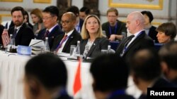  U.S. Under Secretary of State Andrea Thompson, center, delivers her opening remarks during a Treaty on the Non-Proliferation of Nuclear Weapons conference in Beijing of the U.N. Security Council's five permanent members China, France, Russia, the United 