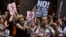 Protesters shout slogans in front of Trump Tower ahead President Donald Trump's visit to the building New York, Aug. 14, 2017.