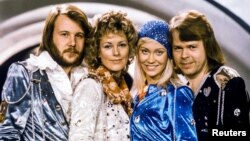 Members of Swedish pop group Abba — Benny Andersson, Anni-Frid Lyngstad, Agnetha Faltskog and Bjorn Ulvaeus — pose after winning the Swedish branch of the Eurovision Song Contest with their song "Waterloo," Feb. 9, 1974.