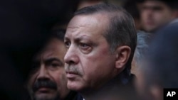 Turkish Prime Minister Recep Tayyip Erdogan at funeral for Serafettin Elci, a prominent Turkish Kurdish politician and former minister, Ankara, Dec. 26, 2012.