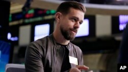 FILE - Twitter's Jack Dorsey is interviewed on the floor of the New York Stock Exchange, Nov. 19, 2015. The chief executive apologized Thursday, Nov. 17, 2016, after the service let through an ad promoting a white supremacist group.