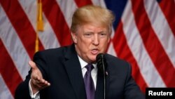 FILE - U.S. President Donald Trump delivers remarks at the Ronald Reagan Building and International Trade Center in Washington, Dec. 18, 2017. 