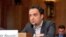Parazit host Kambiz Hosseini testifying before U.S. Senate panel on Iran relations.