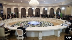 Heads of the Caspian region countries take part in a plenary session during the 5th Caspian Summit in Aktau, Aug. 12, 2018.