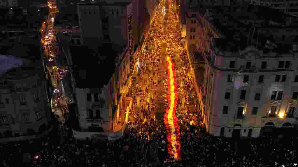 People who are refusing to recognize Peru&#39;s new government gather to protest in Lima, Nov. 14, 2020.