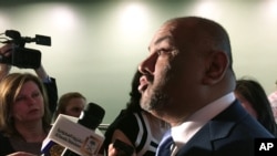 FILE - Yemen's U.N. ambassador, Khaled Alyemany, shown speaking to reporters in May, says the United Nations is expected to officially announce the date for Yemen peace talks soon.