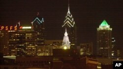 This picture of the Philadelphia Skyline shows some of the building tops lit up in green in a show of support for the Philadelphia Eagles 