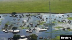 An aerial view shows flooded homes within a village after the River Nile broke the dykes in Jonglei State, South Sudan Oct. 5, 2020. 