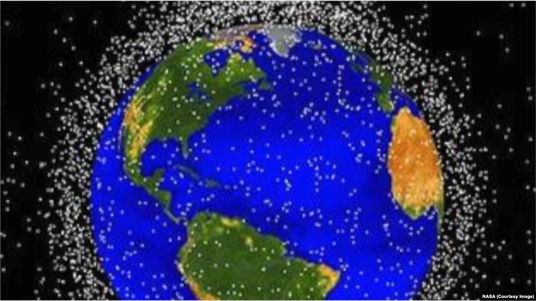 NASA tracks more than 500,000 pieces of space debris as they orbit the Earth, each represented here by a dot.