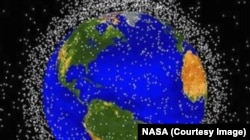 NASA tracks more than 500,000 pieces of space debris as they orbit the Earth, each represented here by a dot.