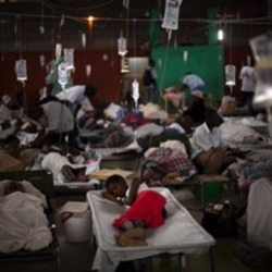 Cholera victims gathered in Cap Haitien, Haiti, in November. Poor conditions after the earthquake in January have helped disease spread