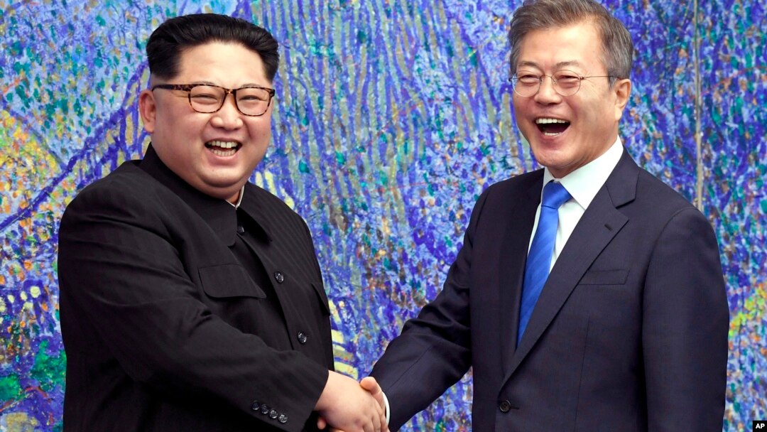 FILE- North Korean leader Kim Jong Un, left, poses with South Korean President Moon Jae-in inside the Peace House in the border village of Panmunjom in Demilitarized Zone, South Korea, April 27, 2018. Talks next week at Panmunjon will set the stage for the third summit between the two leaders.