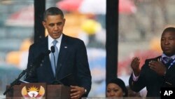 Predsednik Obama pored "lažnog" prevodioca Tamasankve Džančija na Mandelinoj komemoraciji.