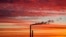 Smoke rises from the chimney stalk of a gas-fired power station after sunset on the outskirts of Minsk, Belarus.