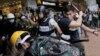 Hong Kong Protesters Warned Not to Return After Clashes Disrupt Government