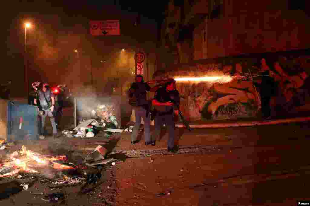 Security forces are seen during a protest against the death of a teenager who disappeared after intervention by military police at Vila Clara neighborhood, in Sao Paulo, Brazil, June 15, 2020.