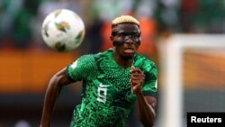 Nigeria's Victor Osimhen chases the ball during the quarterfinals match against Angola at the 2023 Africa Cup of Nations, at Stade Felix Houphouet-Boigny, Abidjan, Ivory Coast - February 2, 2024. 