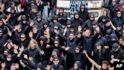 Protesters shout during a rally against the G-20 summit in Hamburg, Germany, July 8, 2017.