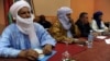 Members of Ansar Dine and Tuareg National Movement for the Liberation of Azawad during a meeting in Algiers, Algeria, December 21, 2012.