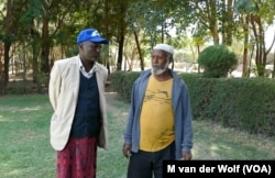 Community Elders Shumi Telila (left) and Ahmed Hamda (right) intervened when protestors were about to attack Maranque Plants, a foreign owned company, Oct. 4, 2016, in the Oromia region, Ethiopia.