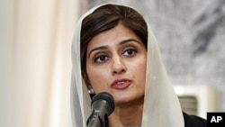 Pakistan Foreign Minister Hina Rabbani Khar speaks during a joint press conference with her Afghan counterpart Zalmai Rasool, unseen, at the foreign ministry in Kabul, Afghanistan, February 1, 2012.
