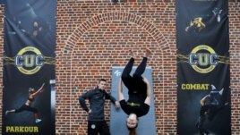 CUC director Lucas Dollfus poses next to student Zoe Simonnuti during a training session at France's Campus Univers Cascade (CUC), a training ground for stuntmen.REUTERS/Pascal Rossignol