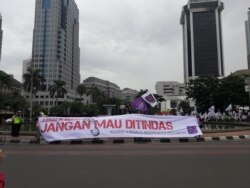 Sejumlah jurnalis saat mengikuti aksi May Day 2019. (Courtesy: Twitter AJI Indonesia)